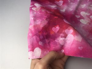 Bomuldsjersey - lækker tie dye i lyserøde toner med hjerter